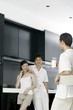 Friends chatting in the kitchen