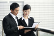 Businessman and businesswoman having discussion