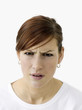 A pensive-looking woman