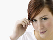 Woman looking at camera shyly