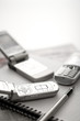 Mobile phones with pen and notebook