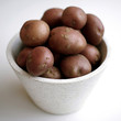 Close up of some red potatoes in a bowl