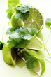 Lime wedges and coriander leaves