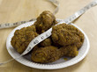 Fried chicken and plastic tape measure