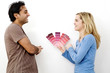 Couple choosing suitable colour from the colour chart
