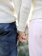 Couple holding hands