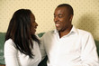 Couple smiling while looking at each other