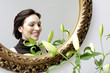 Mirror reflection of woman smiling