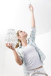 Woman changing the light bulb