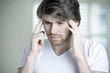 A man having migraine