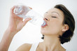 Woman drinking bottled water