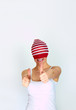 Photo: funny woman hidden under a sock with thumbs up funny woman hidden under a sock with thumbs up