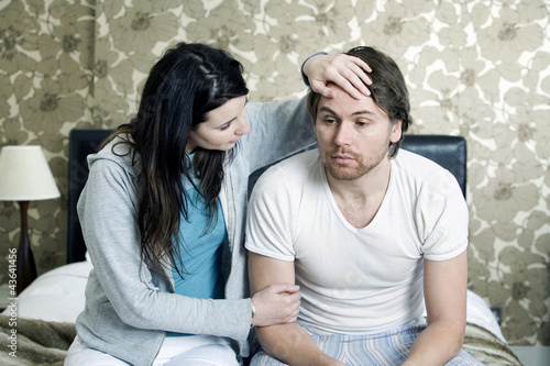 Photo: A woman caring for her boyfriend A woman caring for her boyfriend