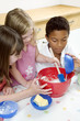 Kids learning baking