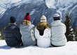 Friends sitting together, enjoying winter scenery