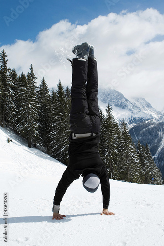 Photo: A man doing handstand A man doing handstand