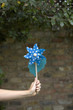 Woman holding a pinwheel
