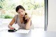 Woman working out some calculations