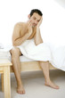 Man sitting on the bed