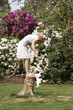 Woman playing with her dog in the park
