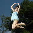 Woman jumping in the air