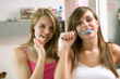 Girls brushing teeth in the bathroom