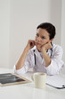 Female doctor contemplating