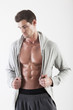 Photo: Portrait of a muscle man posing in studio Portrait of a muscle man posing in studio
