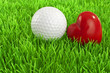 Love Golf - white golf-ball and red heart on the fairway