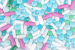 Bright background of various pills and capsules