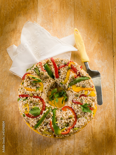 Photo: spelt doughnut with capsicum capers and parsley, vegetarian food spelt doughnut with capsicum capers and parsley, vegetarian food