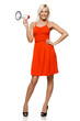 Full length of female in red dress holding loudspeaker