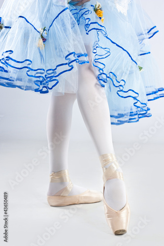Photo: Beautiful ballerina posing in blue dress Beautiful ballerina posing in blue dress