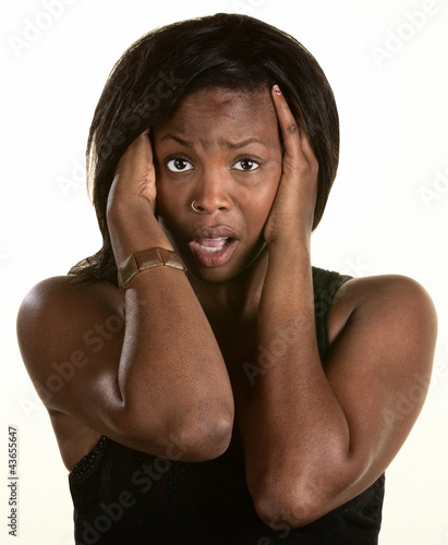 Photo: Frightened Young Woman Frightened Young Woman