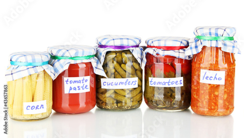 Photo: Jars with canned vegetables isolated on white Jars with canned vegetables isolated on white