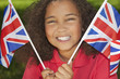 Foto: Beautiful Mixed Race Girl with Union Jack Flags Beautiful Mixed Race Girl with Union Jack Flags