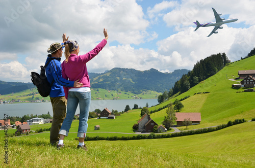 Photo: Travelers against rural scenery Travelers against rural scenery