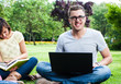 Young people sitting on the grass
