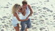 Video: Energetic attractive couple dancing at the beach Energetic attractive couple dancing at the beach