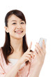 Photo: Beautiful young woman using a mobile phone. Portrait of asian. Beautiful young woman using a mobile phone. Portrait of asian.