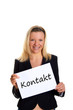young blond business woman with white card - copy space