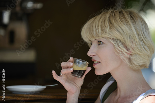 Photo: Woman having a coffee break Woman having a coffee break
