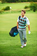 Happy to be his own caddy