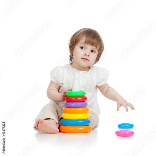 Foto: adorable baby playing with color toy adorable baby playing with color toy