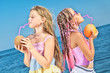 Photo: Two little girls with fruit Two little girls with fruit