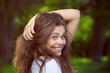 Portrait of a beautiful young smiling girl