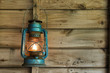 Rusty lantern hanging in a shed