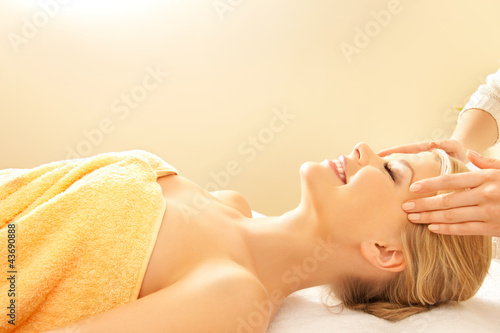 Photo: beautiful woman in massage salon beautiful woman in massage salon