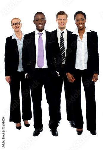 Photo: Full length portrait of business colleagues Full length portrait of business colleagues