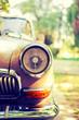 Close-up photo of retro car headlights